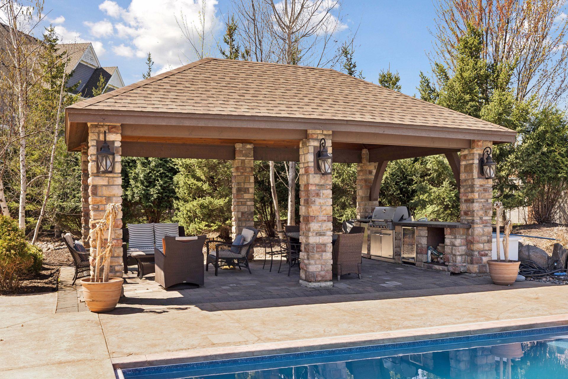 Gather with friends and family in the covered pool pavilion, the ideal spot to relax and dine al fresco