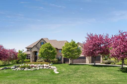 Lovely landscaping and curb appeal, plus a 4 car garage