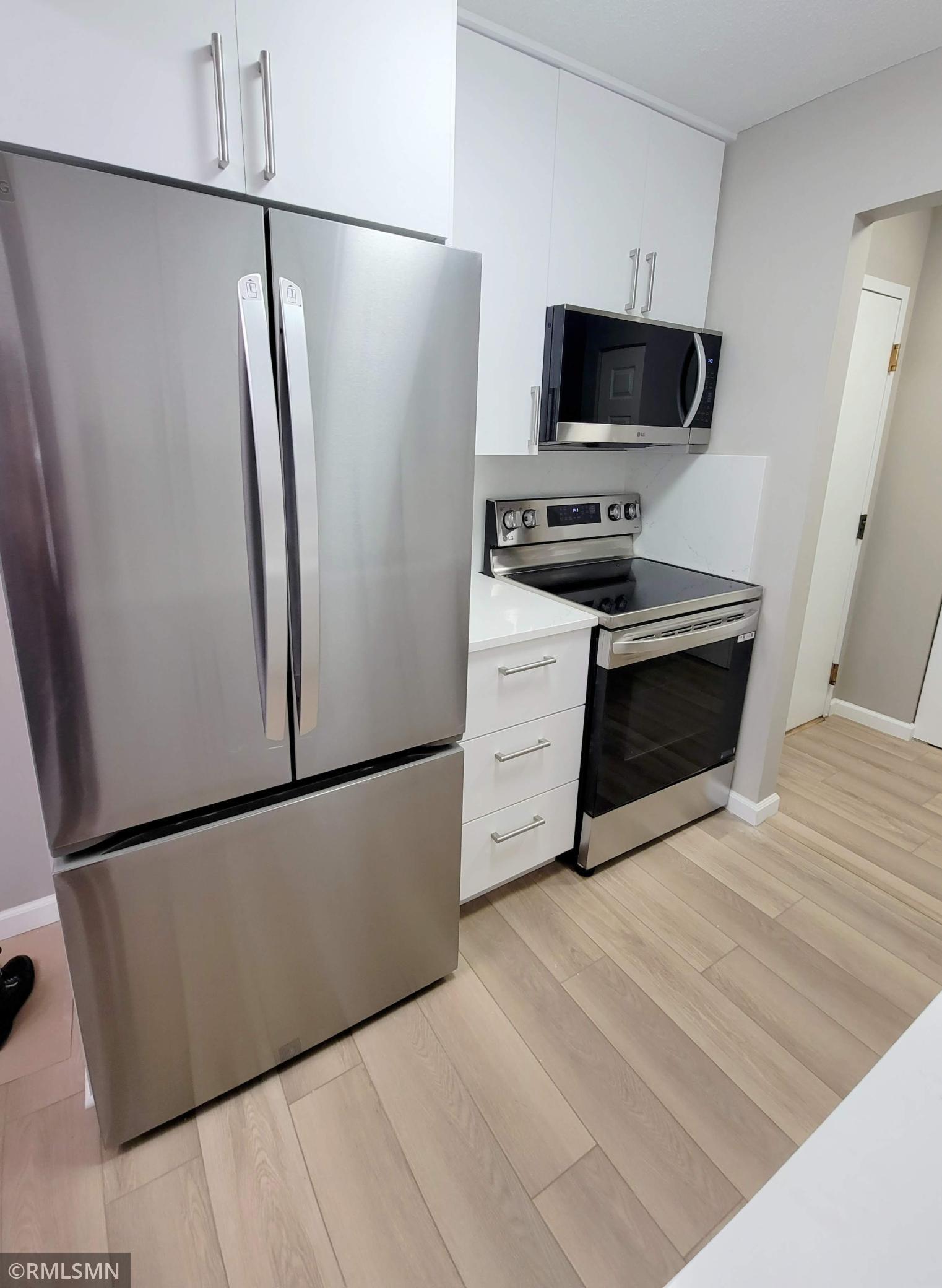 Kitchen has LG SS appliances