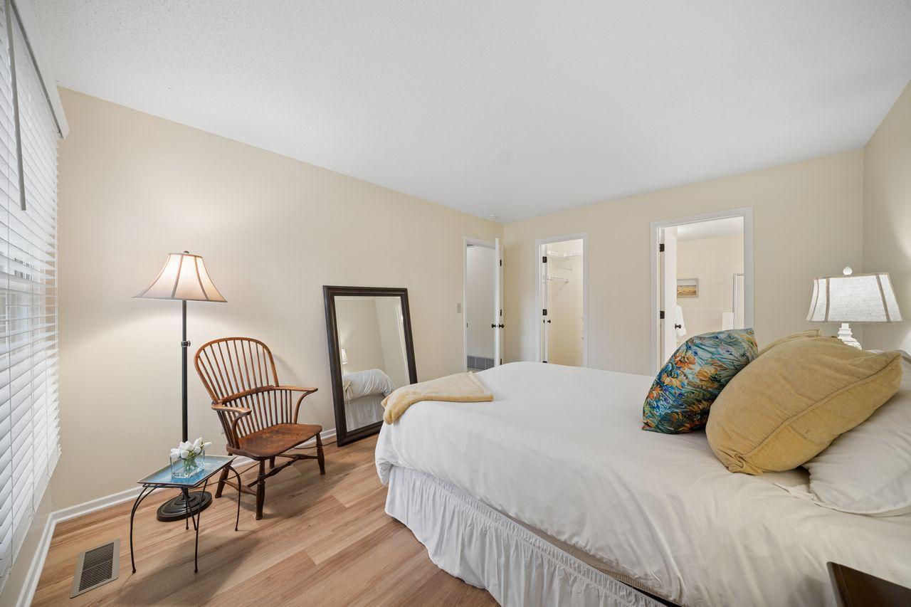 The primary bedroom comes with the ensuite bath and a walk-in closet.