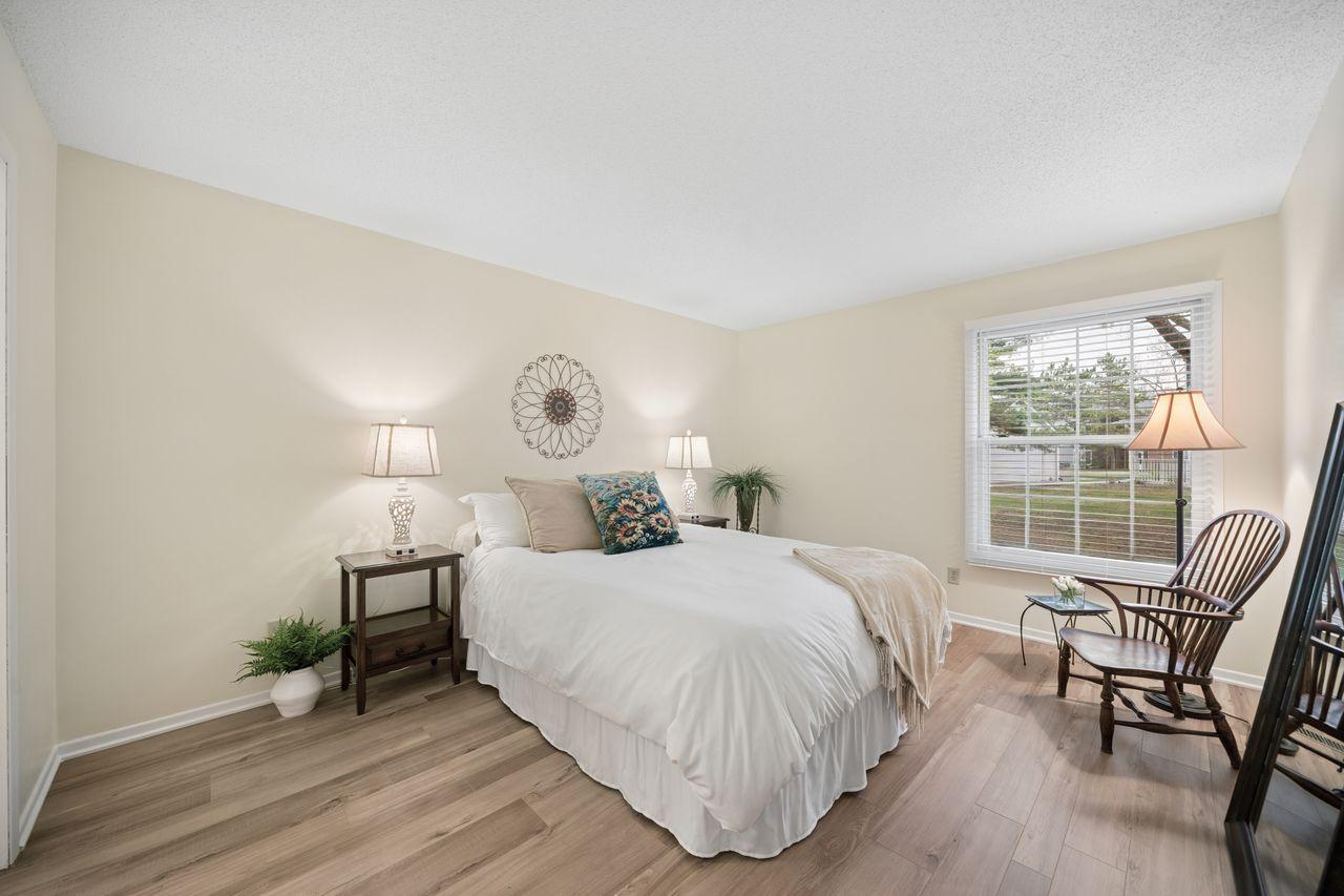 Primary bedroom overlooking the quiet courtyard, back of the buiding.