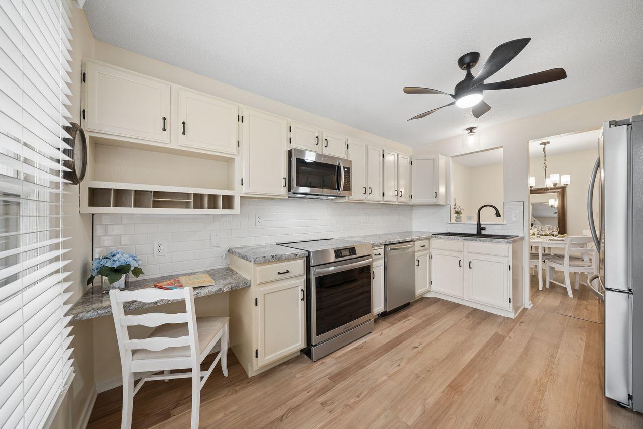 Brand new appliances, including a full size French-style refrigerator.