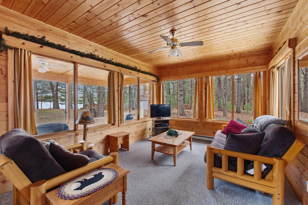Living room with knotty pine walls for that "Up North" cabin feel.