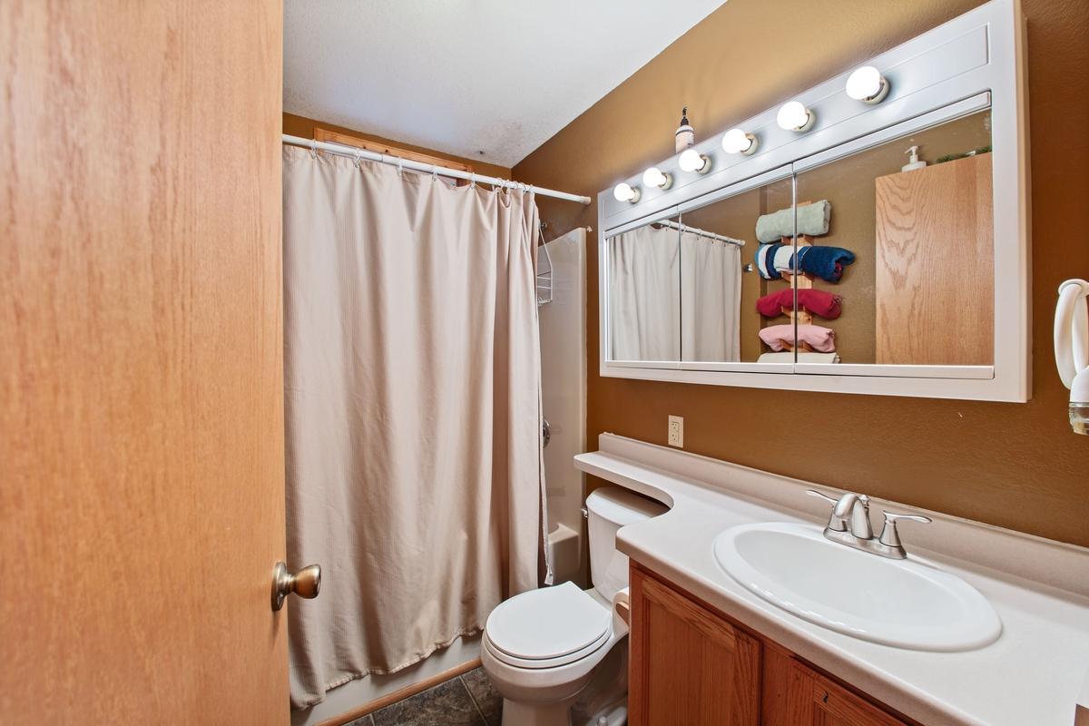 Main level full bathroom.