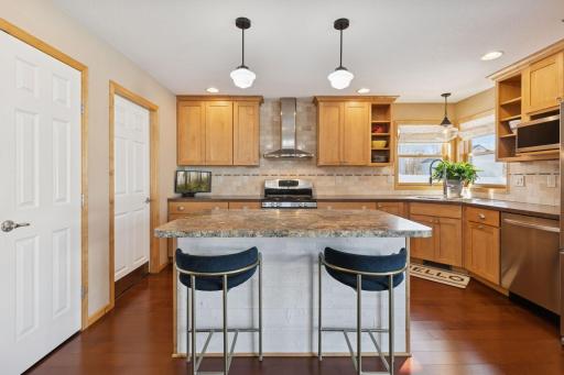 Kitchen is nice and bright with tons of cabinet space.