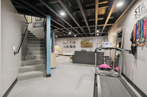 Flexible layout for movie nights, workouts, or play space.