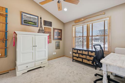 Flexible main-floor room ideal as an Office or 4th Bedroom.