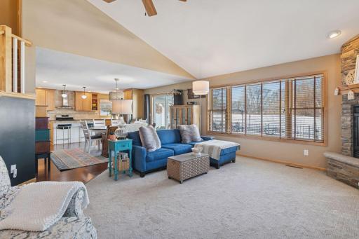 Open sightlines to kitchen and dining for easy entertaining.