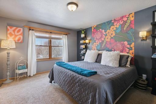 Spacious Ownerâs Suite with walk-in closet.