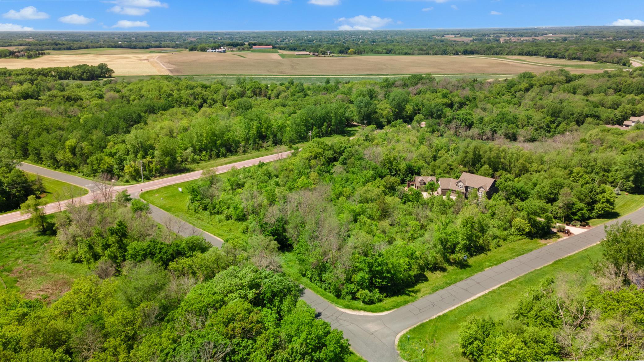 Beautiful 3 Acre Corner Lot, offers plenty of room for separate outbuilding