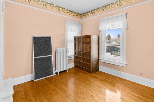 Upstairs features 4 bedrooms and full bath