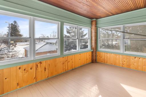 Upper level bonus room/sun room with view overlooking town - many possibilities for this space!