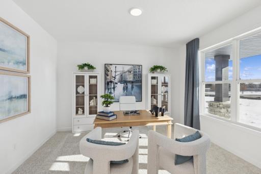 (Photo of actual model) A first-floor flex room is situated just off the entry, ideal for working remotely or getting paperwork done.