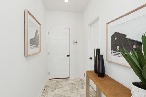 (Photo of actual model) A mudroom to keep you organized!