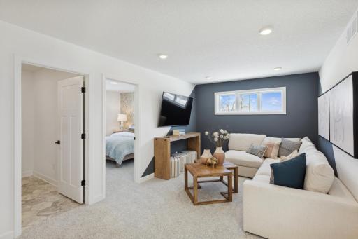 (Photo of actual model) The upper level loft provides another spot to gather!