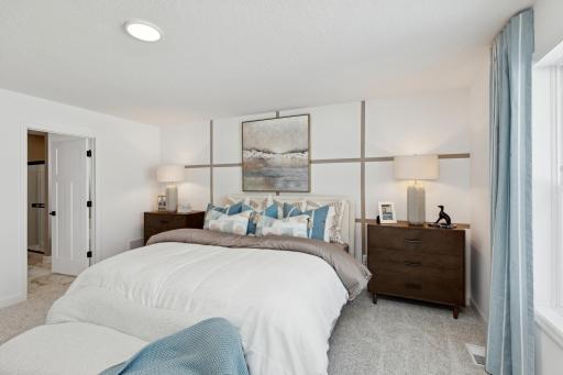 (Photo of actual model) Another view of the primary suite.