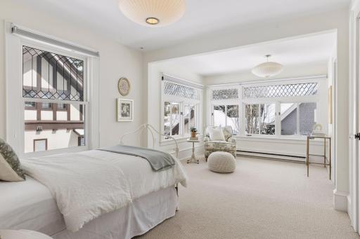Second ensuite bedroom with leaded glass windows and sitting room