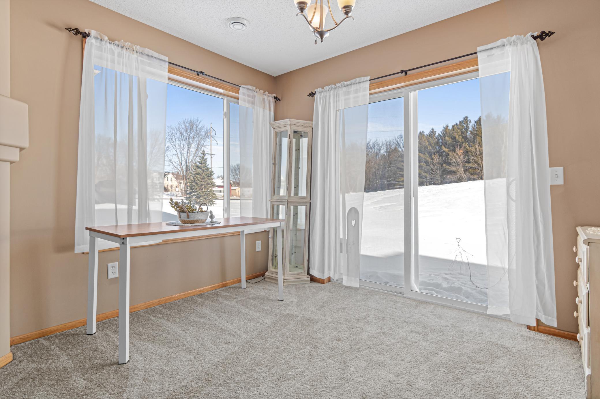 Main level dining room with LOTS of light
