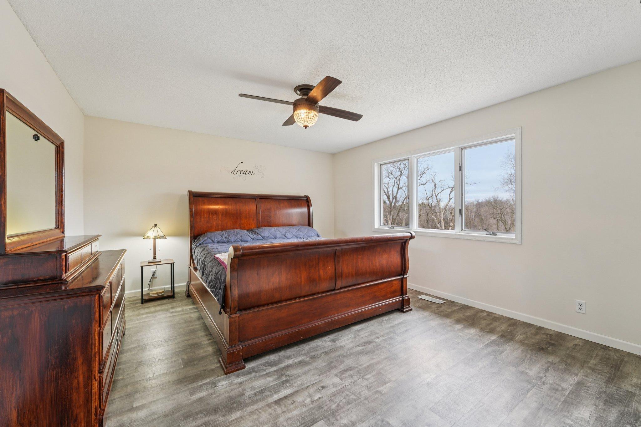 Owners Suite with walk in closet and private 3/4 bath