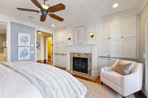 Wall of built-ins and fireplace