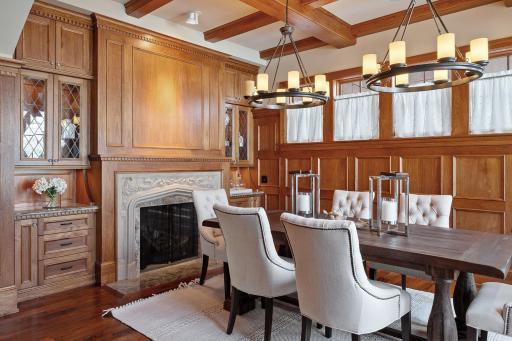 Dining room with lake view, built-ins and its own fireplace
