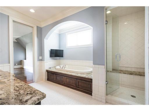 Soaker tub and glass enclosed shower