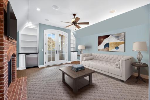 3rd floor family room with tree top views of the lake!