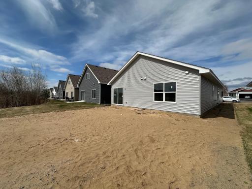 Backyard patio, sod, and irrigation included