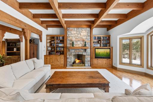 Stone fireplace accented by Lake Superior timber