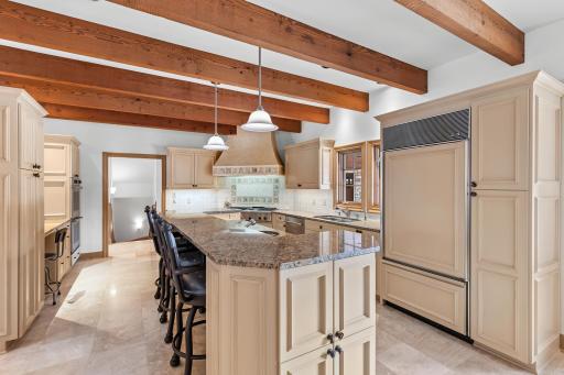 Casual counter dining with customized cabinetry and planning spaces