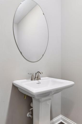 The main level Powder Room is just off the Foyer.