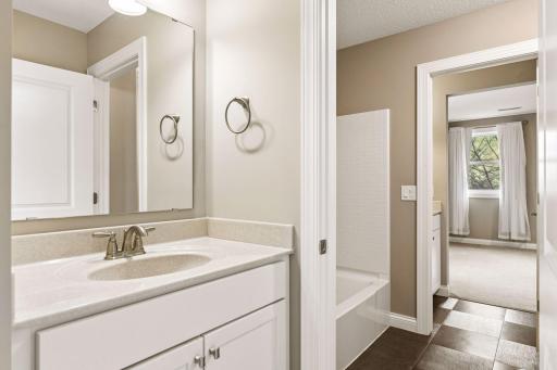 Two of the bedrooms share a full Jack-and-Jill bathroom.