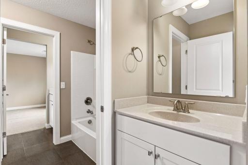 The bedrooms each enjoy their own private vanity.