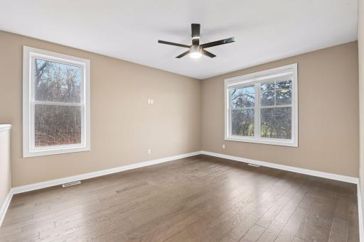 The Den in the main floor Office is a great spot to curl up with a good book or hang out and cheer on your favorite sports team.