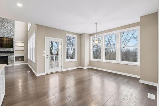 The Dining Room overlooks the backyard and offers access to the large deck.