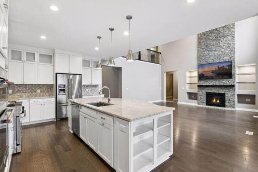 The large island is the perfect gathering space for everything from morning breakfasts to holiday gatherings.