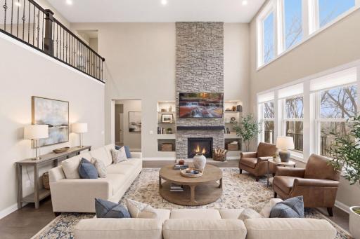 Virtually staged - enjoy this gorgeous Family Room with floor to ceiling windows