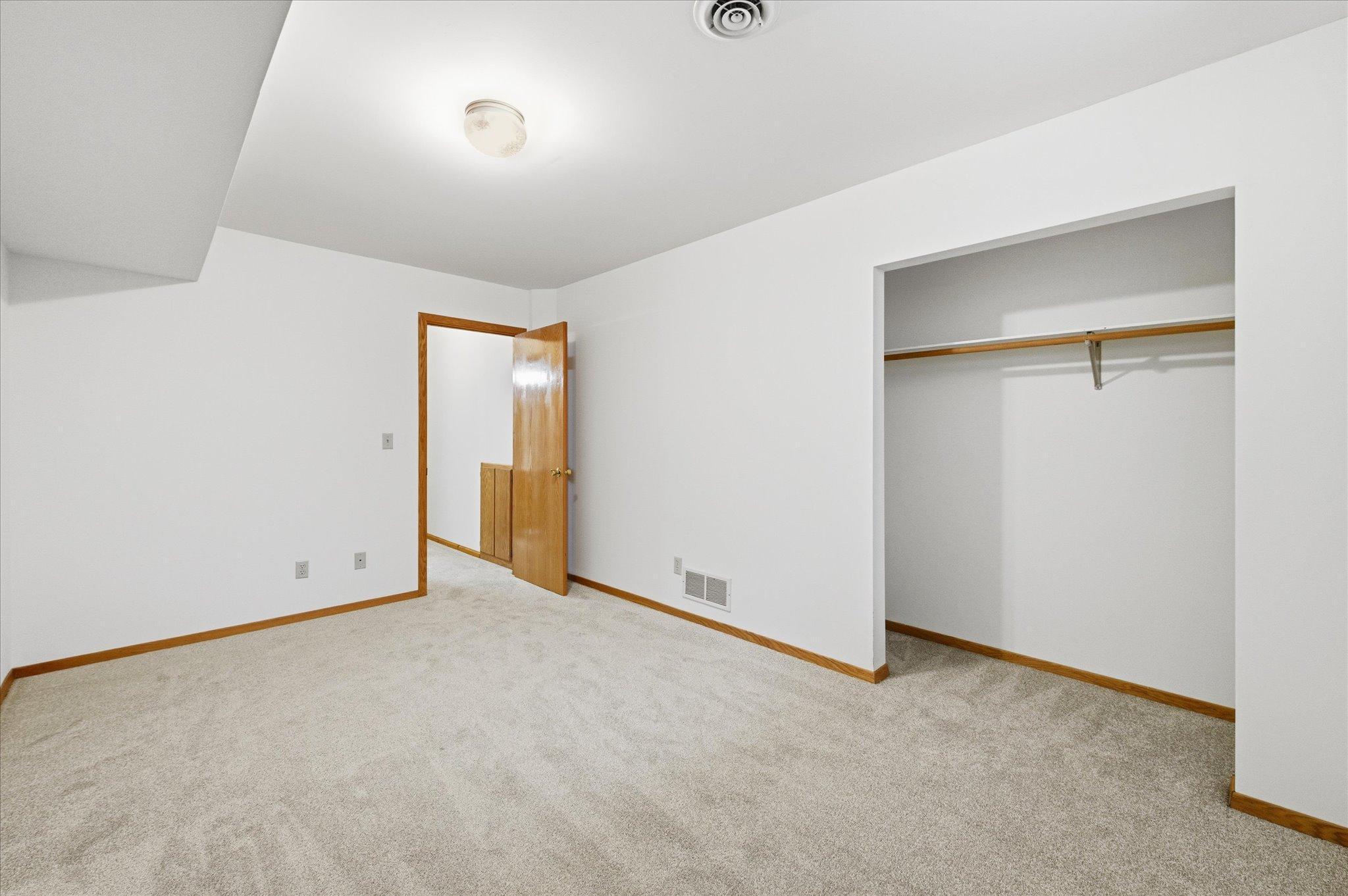 2 lower level bedrooms with new carpet
