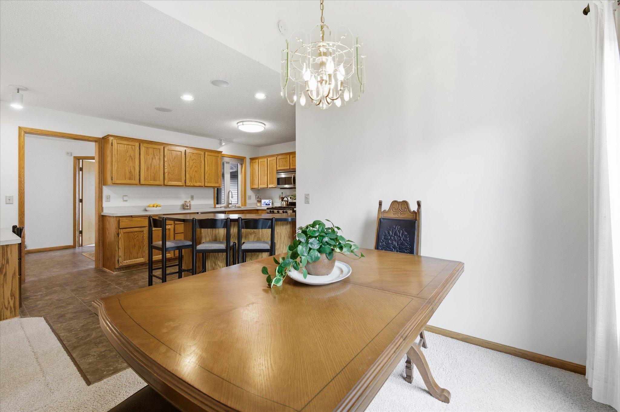 Informal dining is open to the kitchen