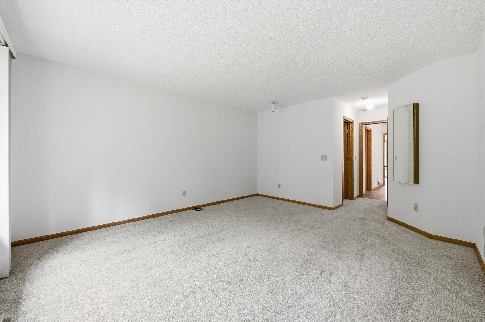 Upper level bedroom with walk-in closet