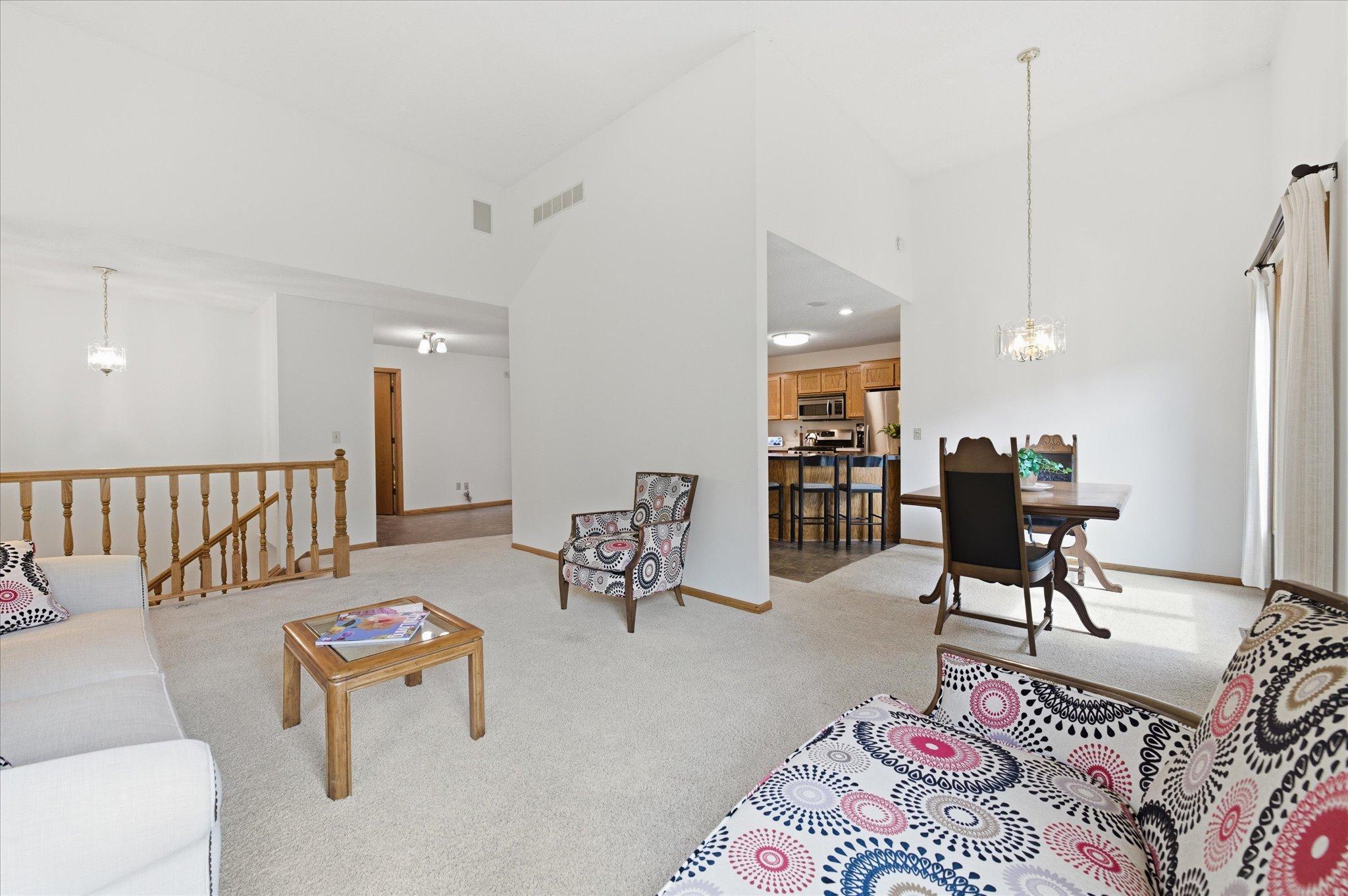 Living room opens to the Living room and the 4 season porch