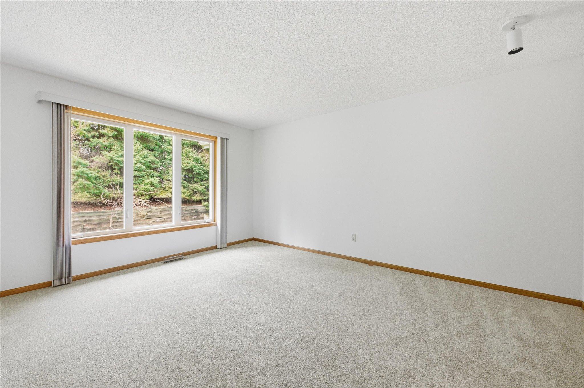 New carpet in the upper level bedroom