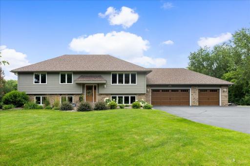 Meticulously maintained home on 5 glorious acres!