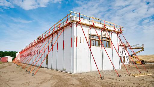 Professional Photo ICF Foundation shows how the home can easily accommodate tall 9+ foot walls on all levels. ICF can accommodate as many windows as the client desires in a home.
