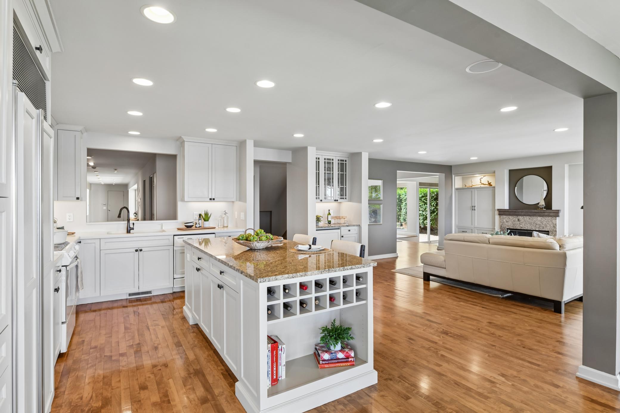 The kitchen offers a great view of the beautiful gallery hallway