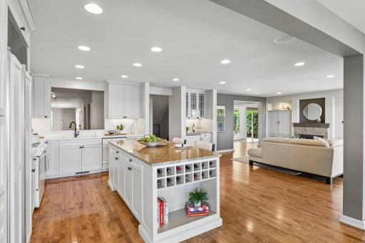 The kitchen offers a great view of the beautiful gallery hallway