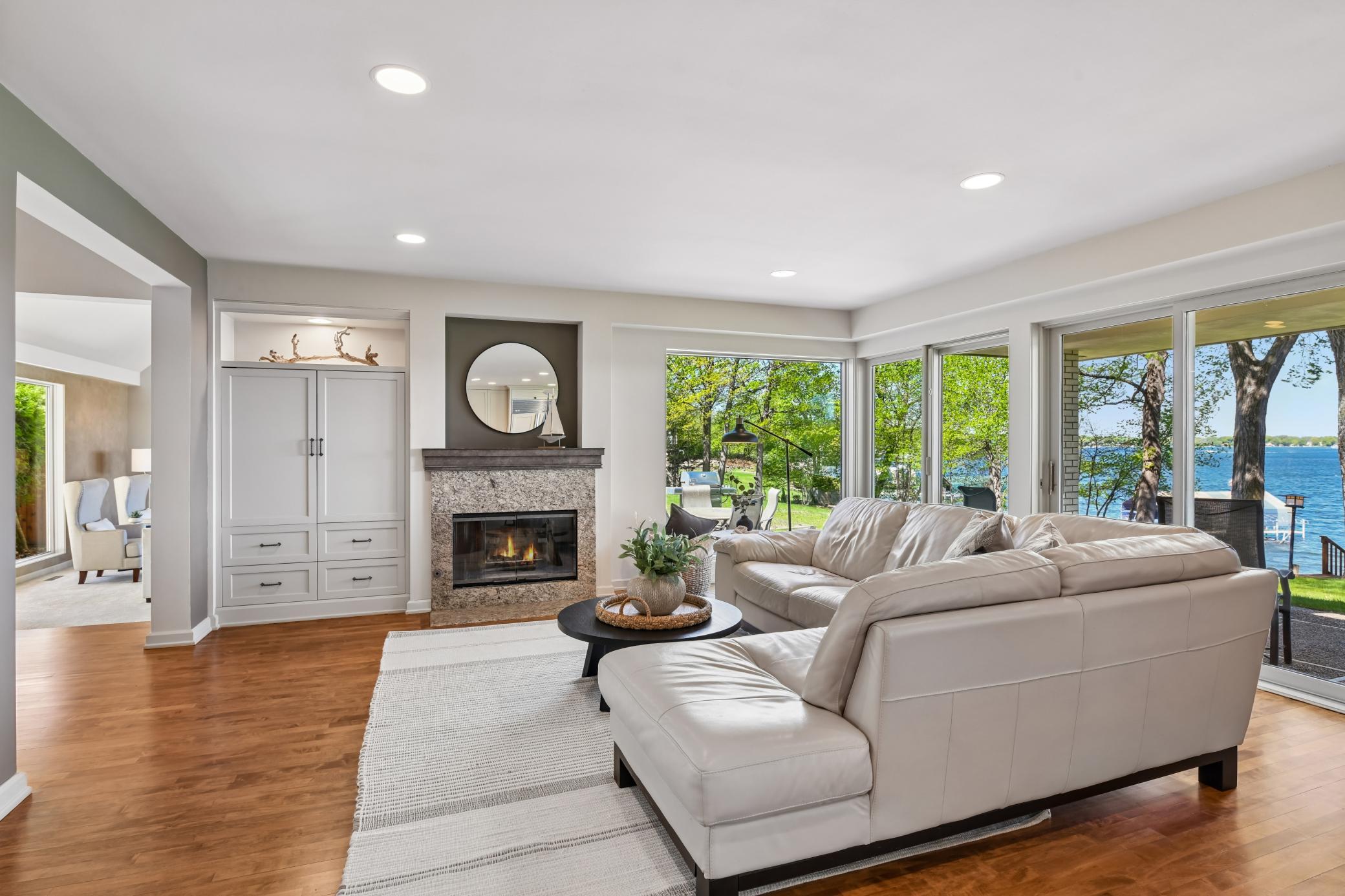 The hearth room, kitchen and dining area create the perfect daily spaces connected for ease and light filled with panoramic views.