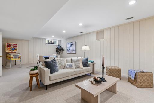 The lower level rec room is a fun getaway perfect for movie or game nights.