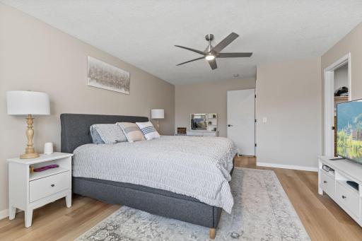 Another view of the primary bedroom, with the closet located to the right.