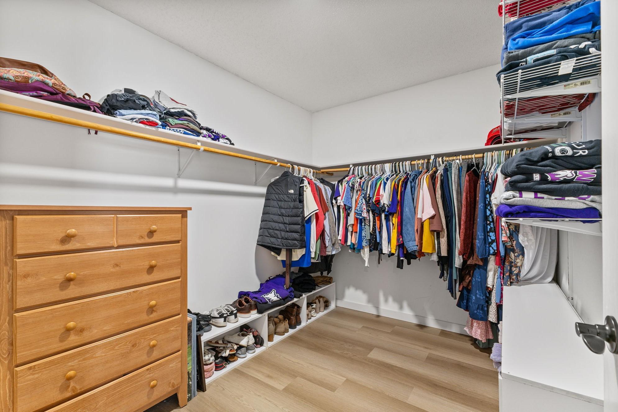 This closet measures an impressive 10' x 8', spacious enough to accommodate dressers, an abundance of shoes, and even more clothes!